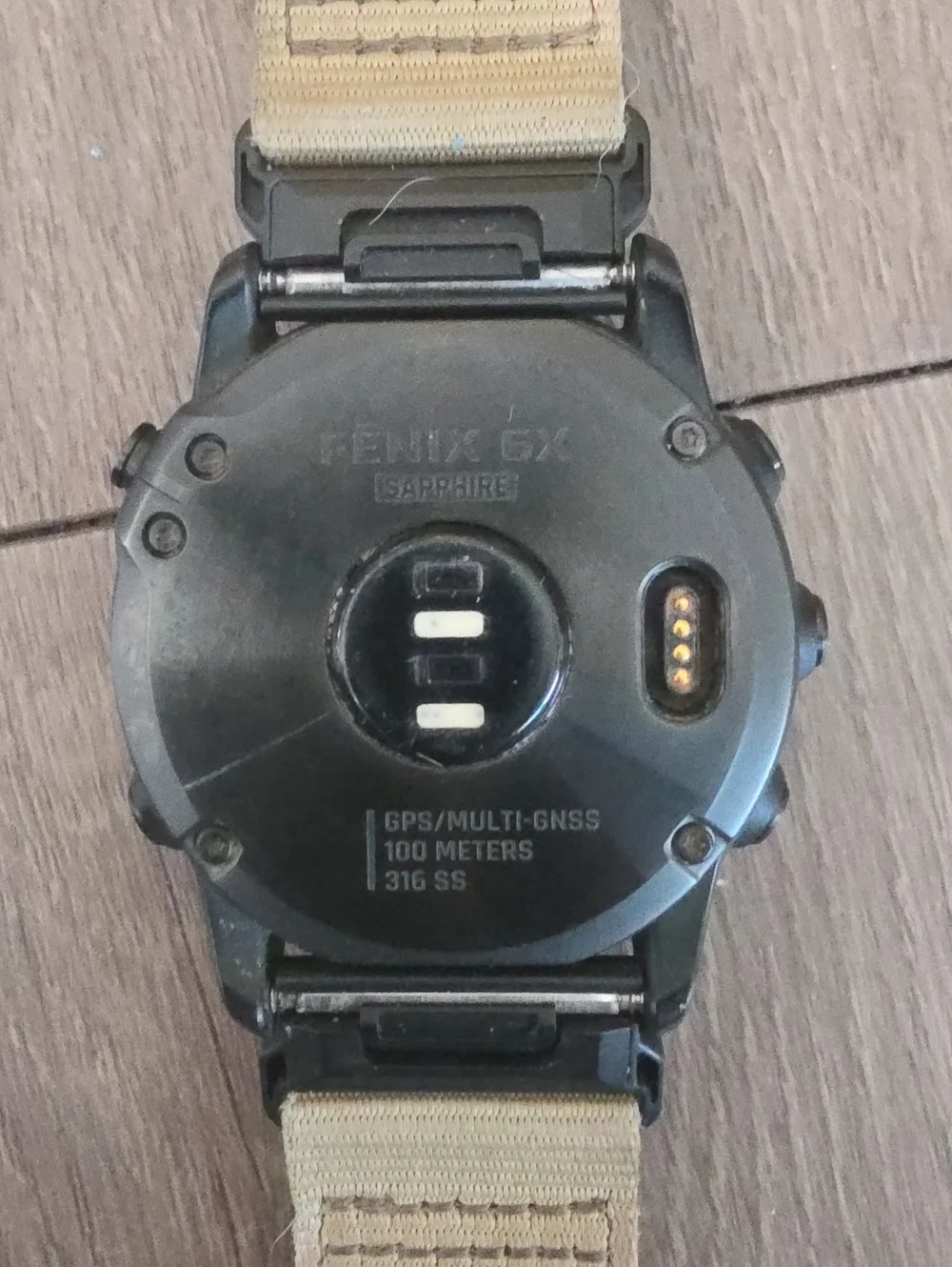 garmin Fenix GX watch back in black with tan strap